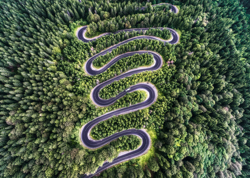 Winding,Road,From,The,High,Mountain,Pass,In,Transylvania,,Romania.
