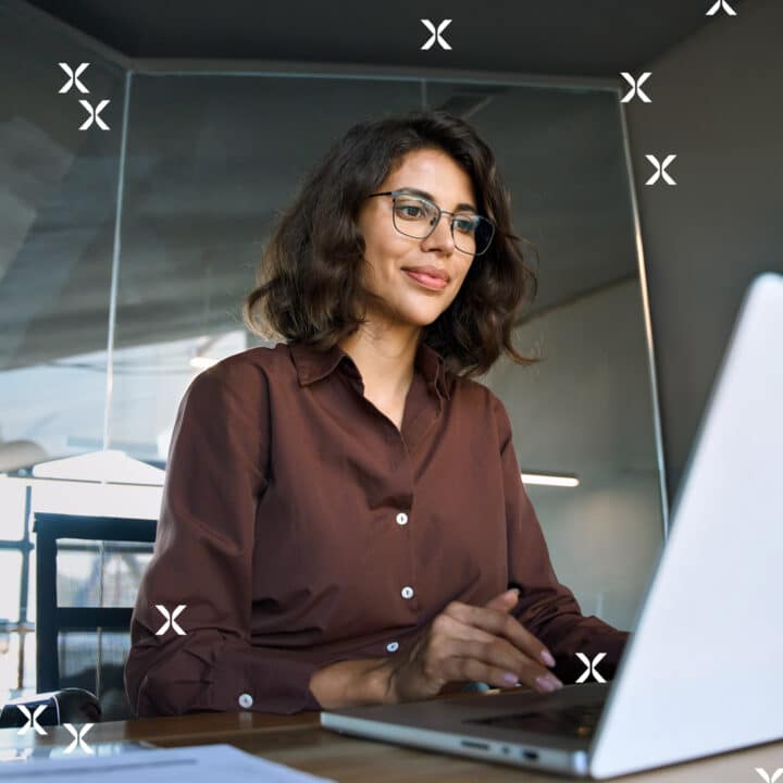 Woman typing at computer