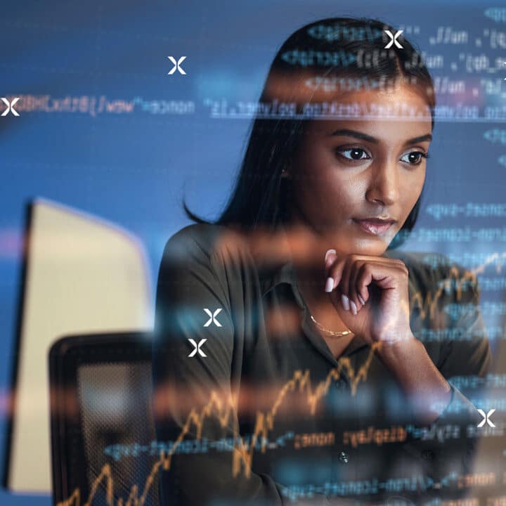 Woman looking at screen of data