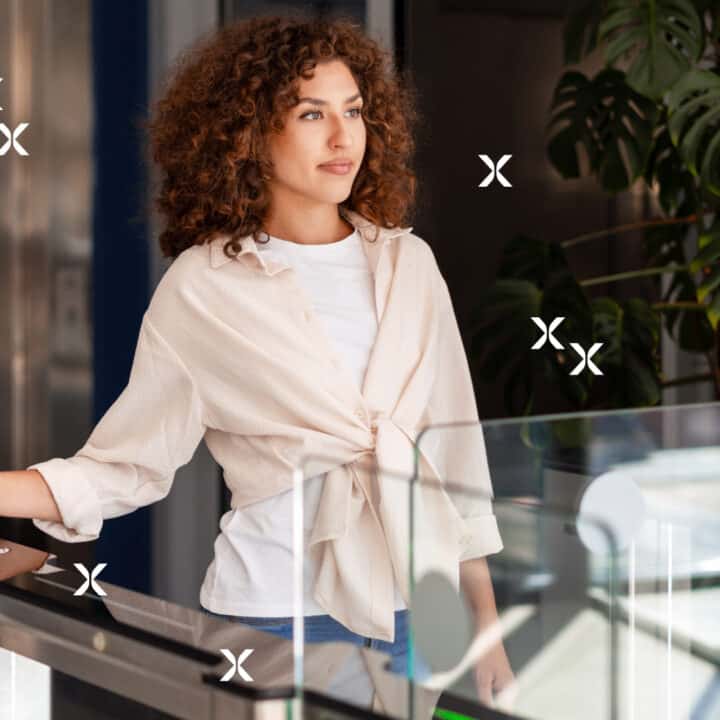 Woman swiping badge into office building